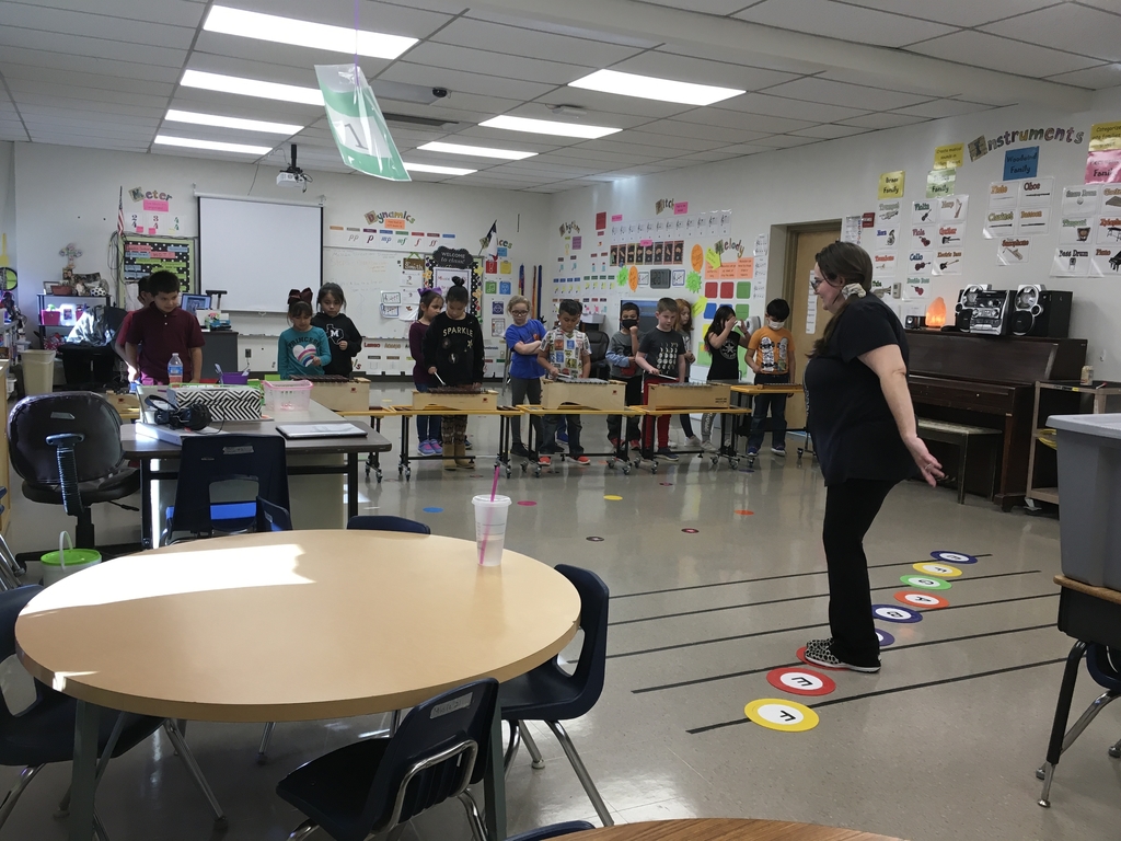 2nd grade learning and playing notes of the staff with Xylophones