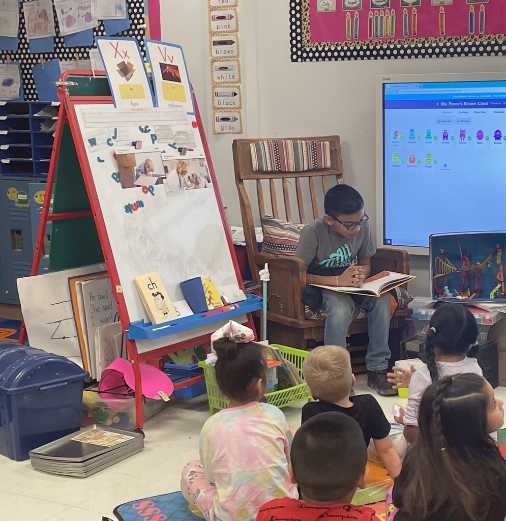 5th Grade Book Club students reading to Dillman for Read Across America.